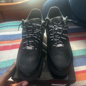 Supreme Black Sneakers with Cushioned Midsole and Mesh Upper